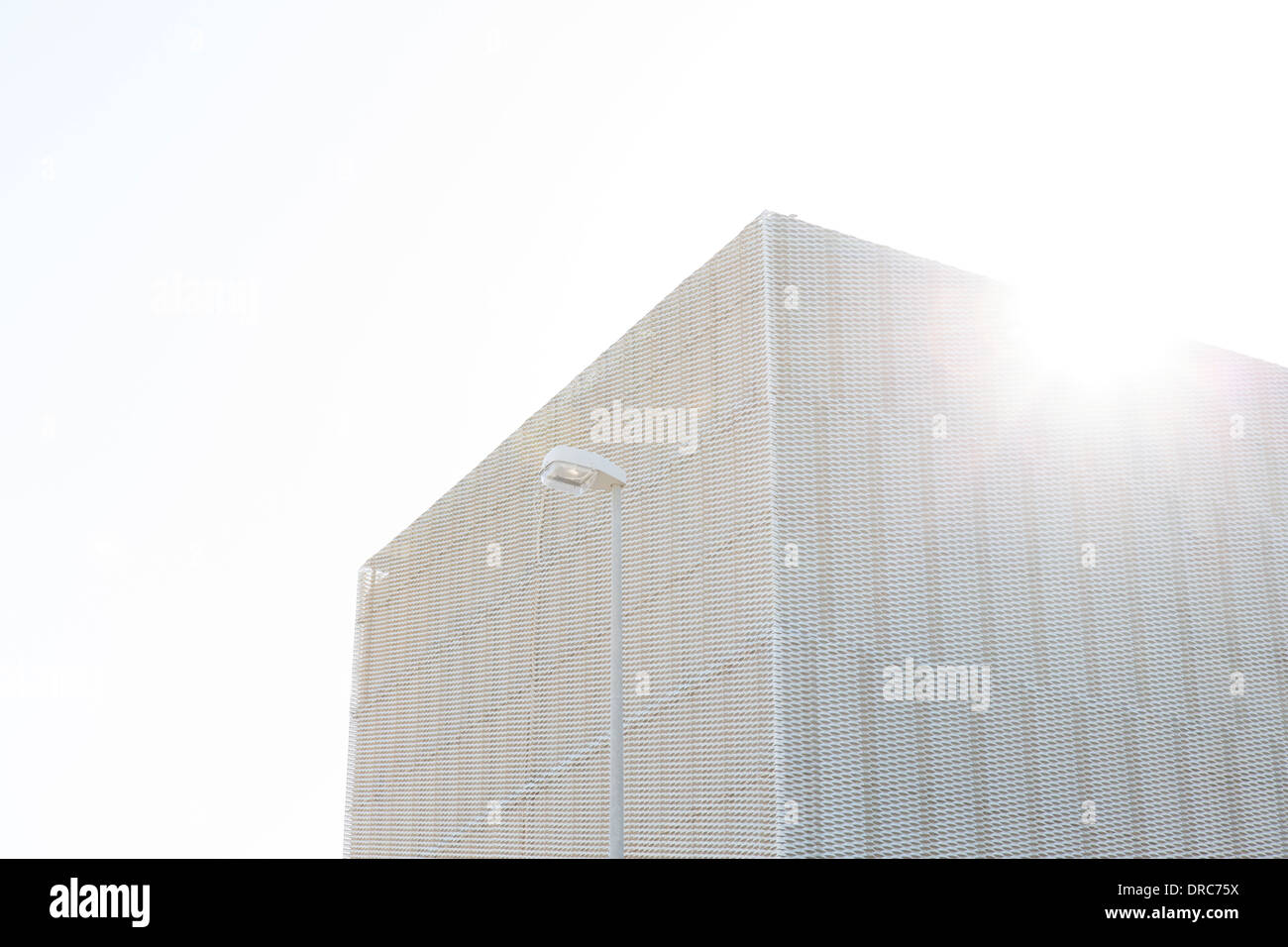 Sun shining over modern building Stock Photo