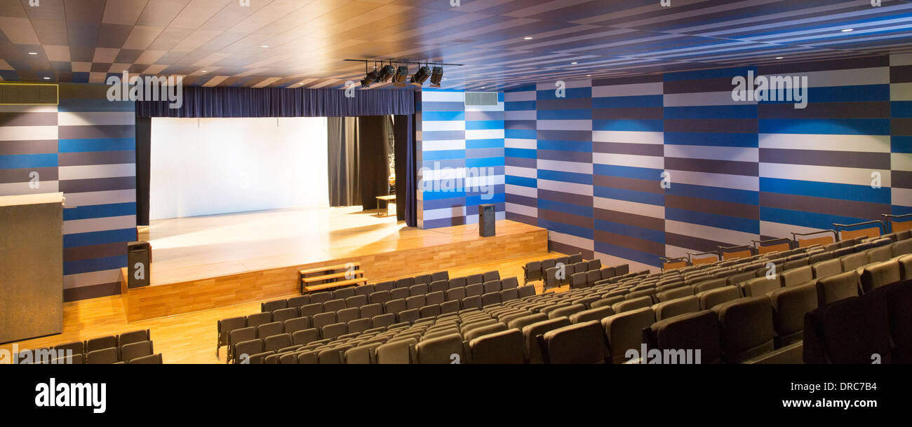 Seats and stage in empty auditorium Stock Photo