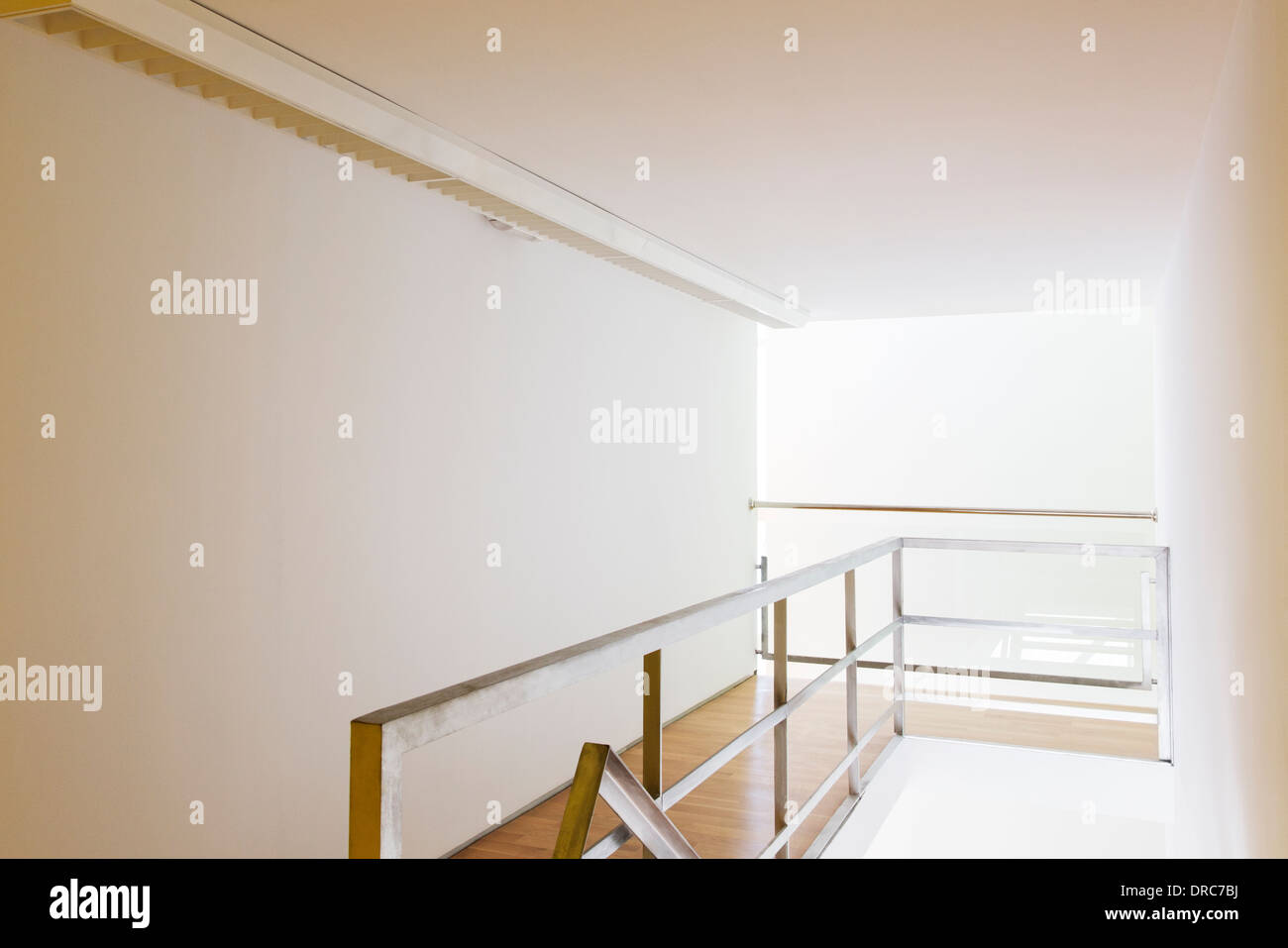 Railing and corridor in office Stock Photo