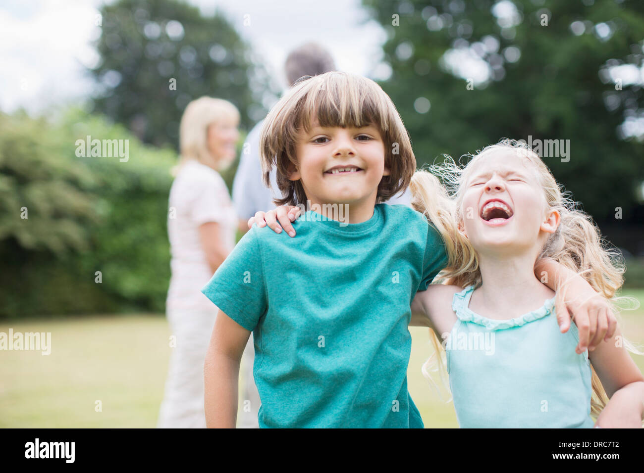 Children playing together outdoors Stock Photo