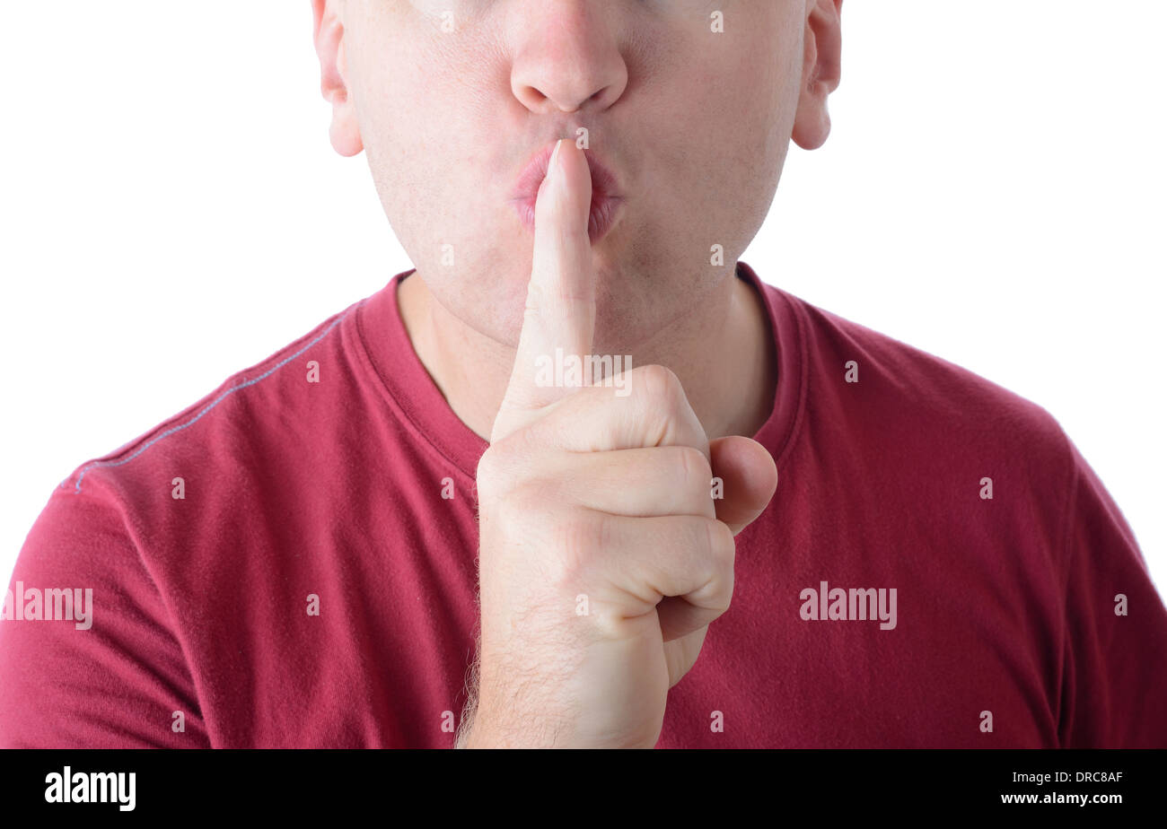 concept of quiet or secret, finger over lips isolated on a white background Stock Photo