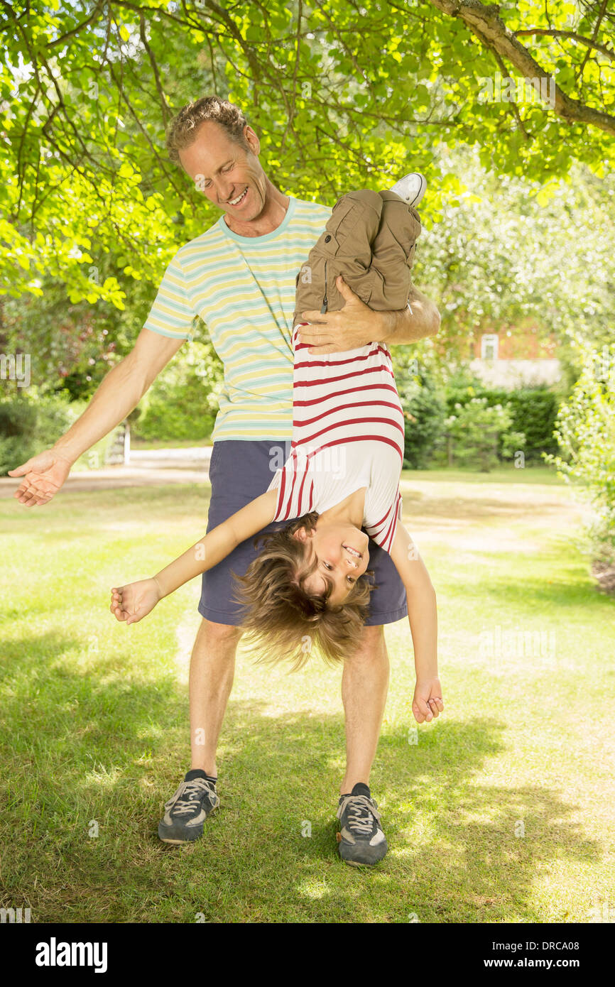 Child hanging upside down in hires stock photography and images Alamy