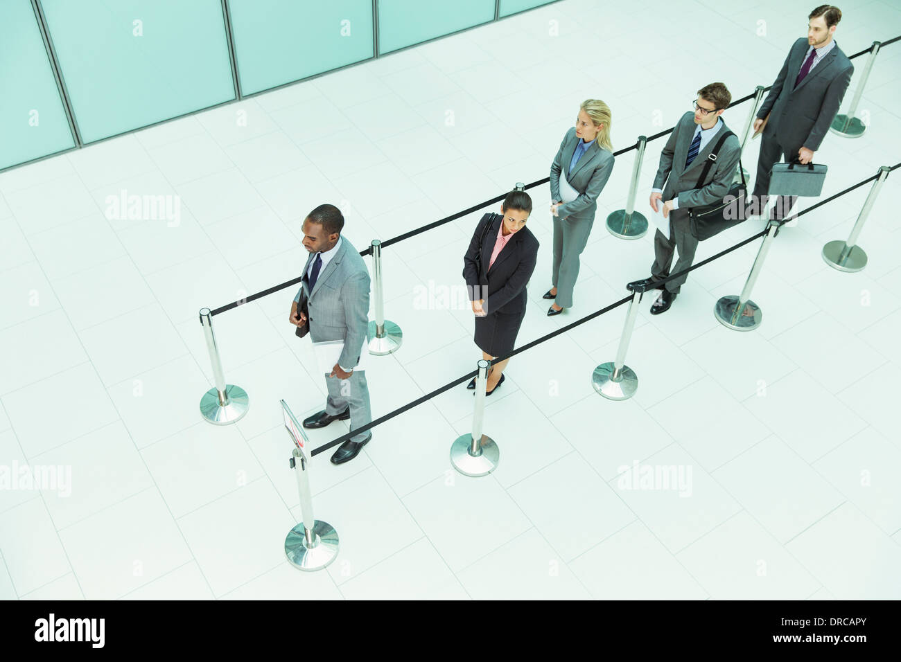 Business people waiting in line Stock Photo