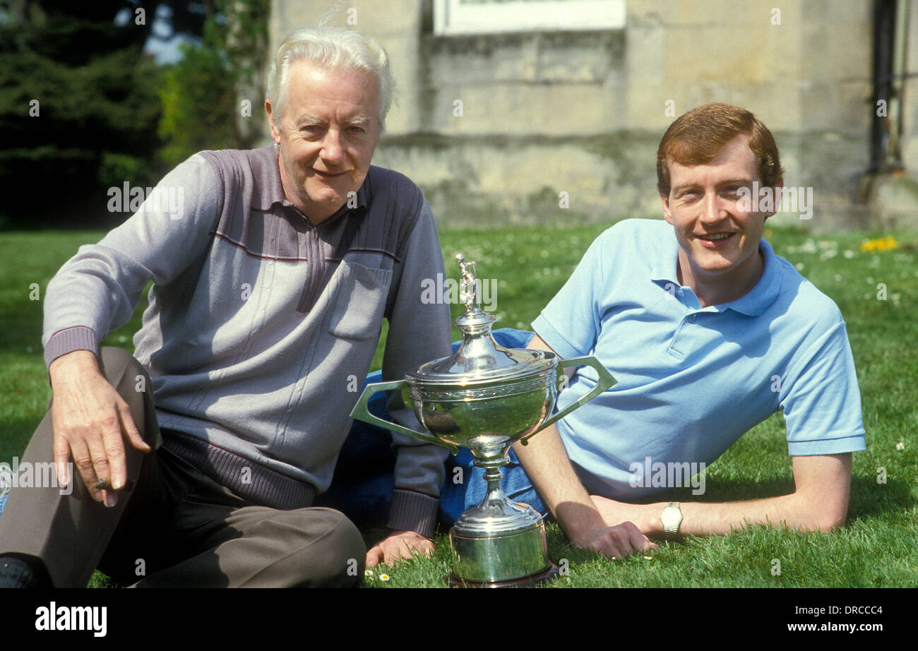 Steve Davis Embassy World Snooker championships at Sheffield Crucible Theatre with dad bill and trophy after win Stock Photo