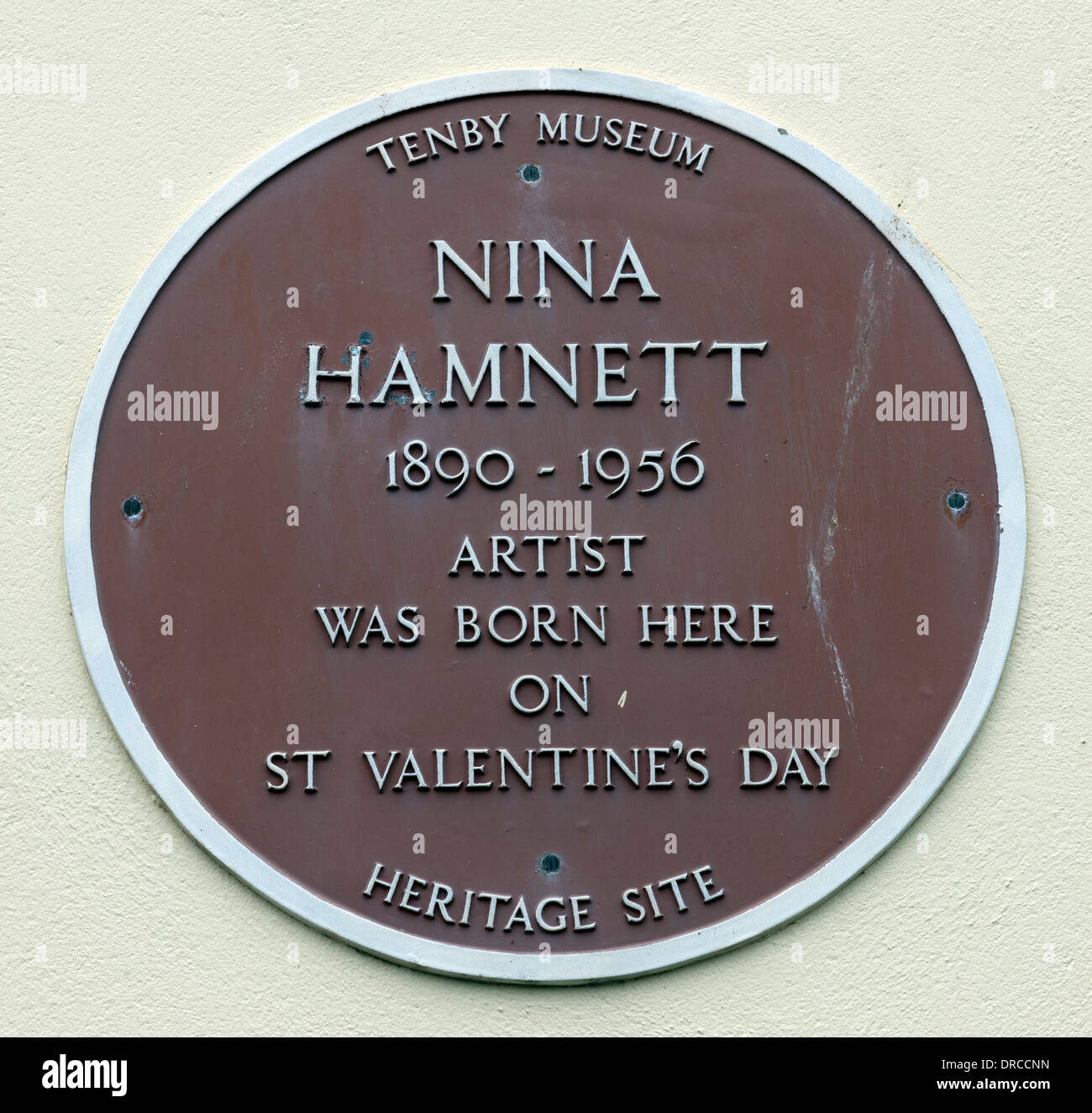 Blue plaque (brown) for Nina Hamnett at 3 Lexden Terrace, Tenby, South Wales, United Kingdom Stock Photo