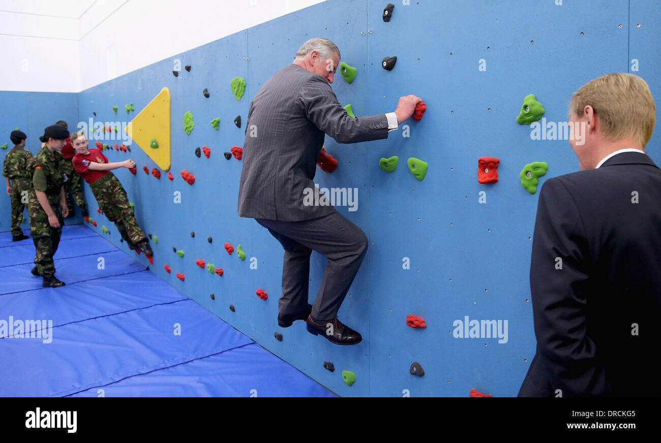 Prince Charles, Prince of Wales climbs on the new traversing wall in(00)