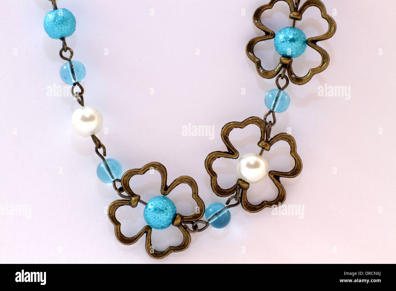 Hand made necklace on a white background Stock Photo
