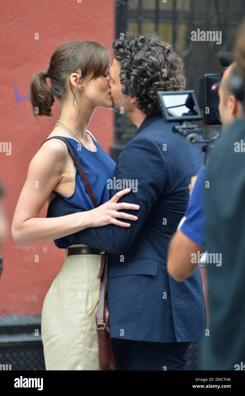 Keira Knightley and Mark Ruffalo  share a kiss while filming their new movie 'Can A Song Save Your Life?' New York City, USA - 19.07.12 Stock Photo