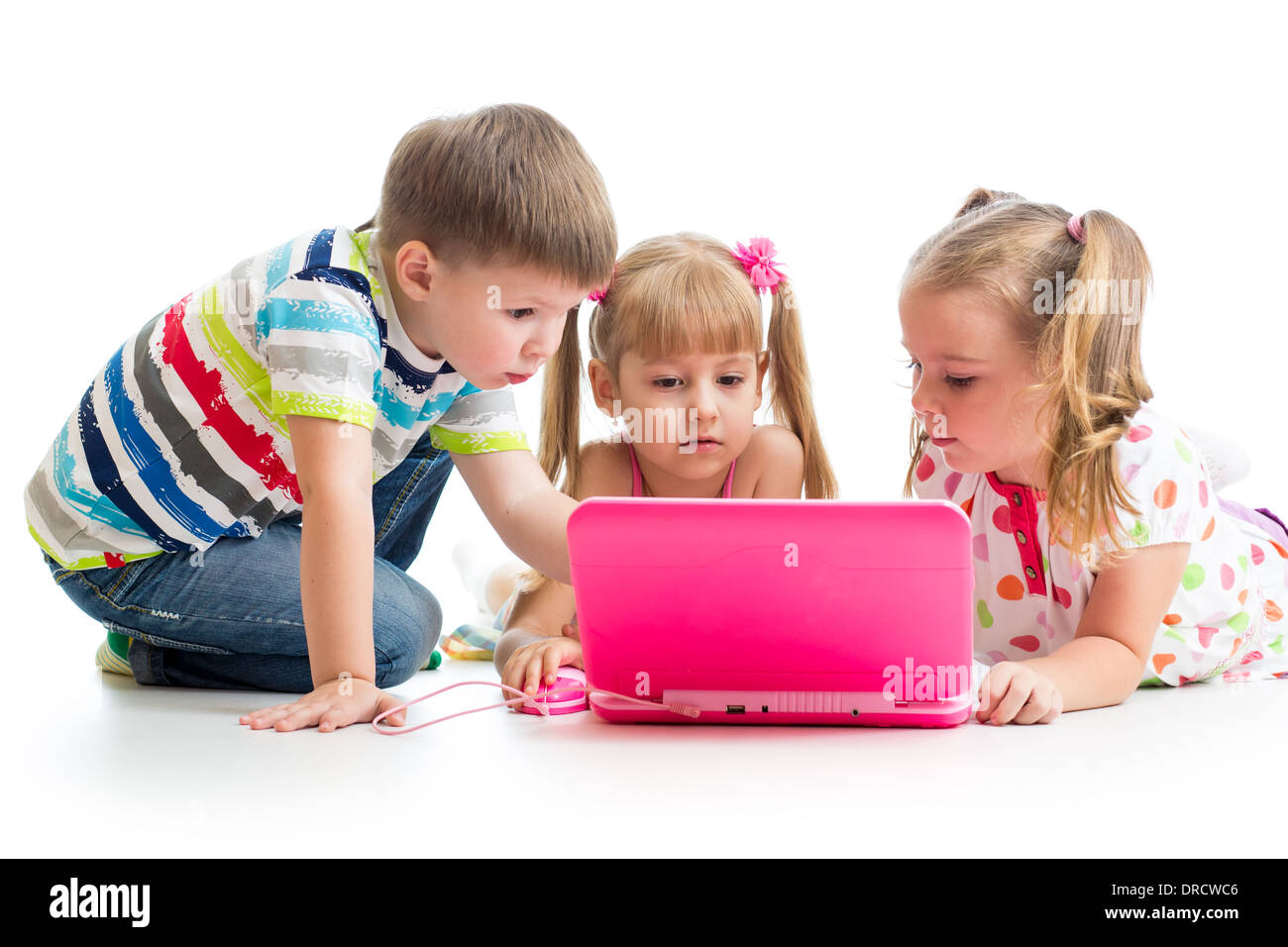 group of kids friends looking at the laptop Stock Photo