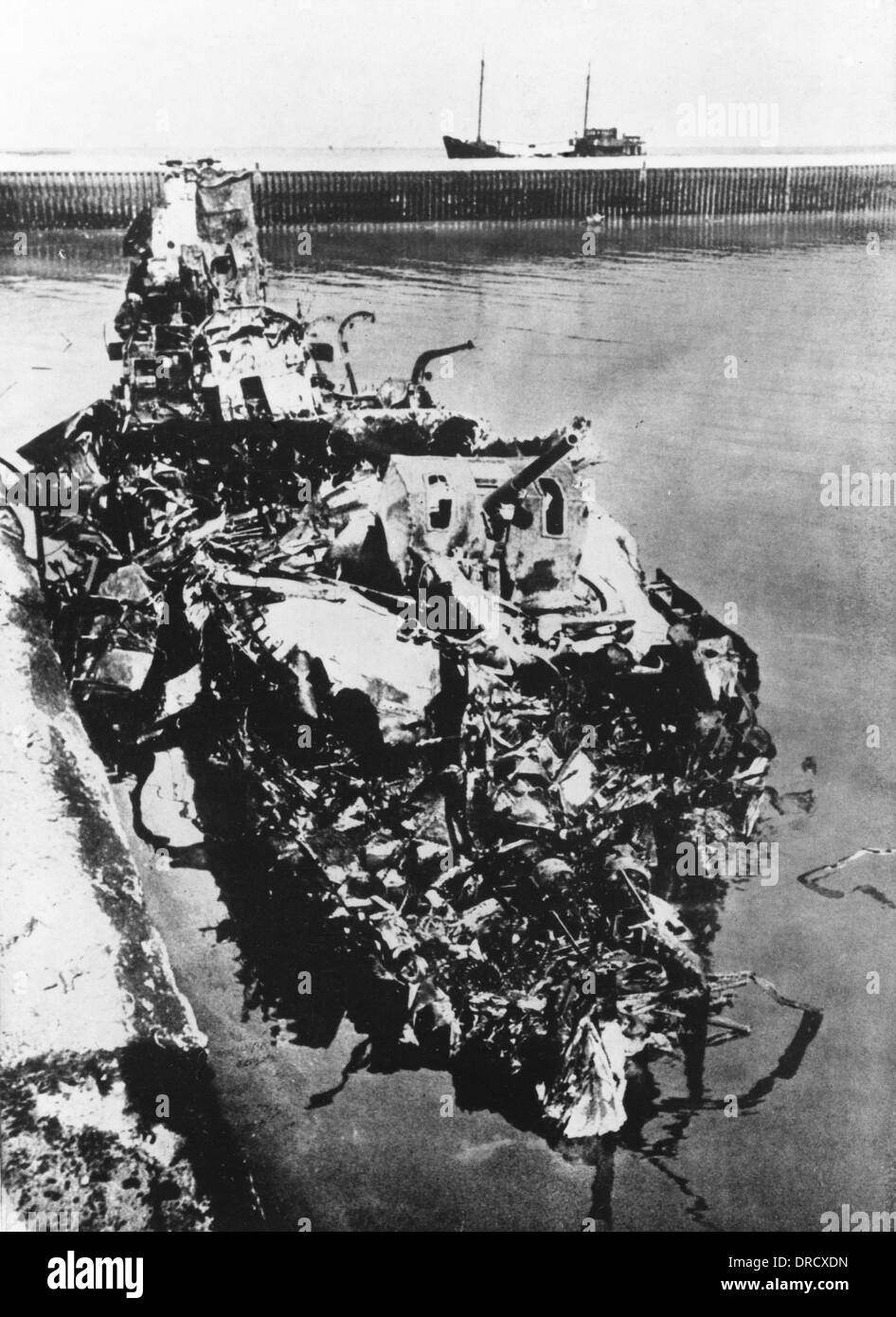 Destroyed warship WWII Stock Photo