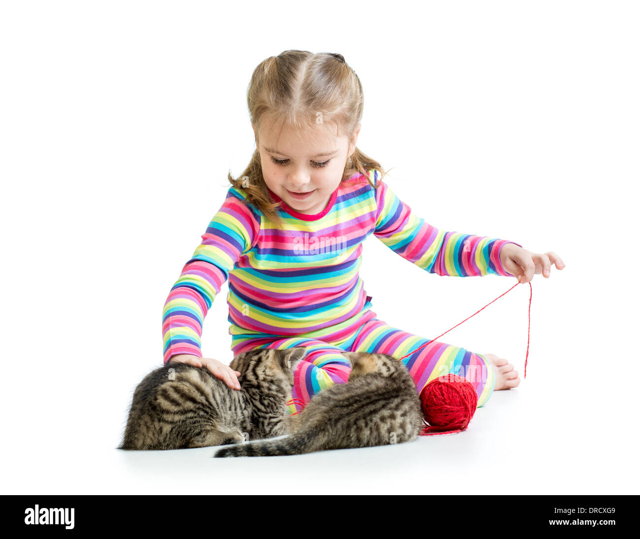 child girl playing with kittens isolated on white background Stock Photo
