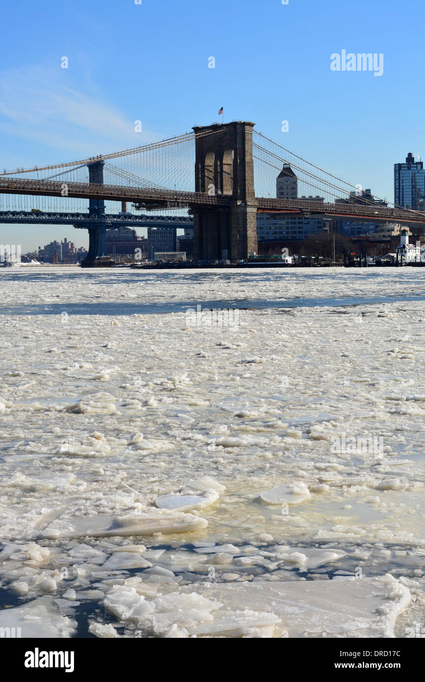 New York, USA. 22nd January 2014. Ice chunks in the East River as freezing temps continue in Lower Manhattan. Credit:  Christopher Penler/Alamy Live News Stock Photo