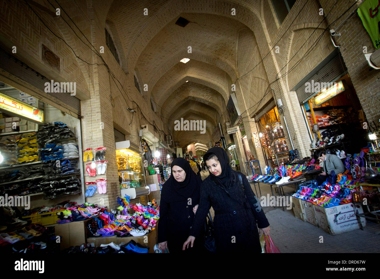Tehran, Iran. 23rd Jan, 2014. Iranian women shop at an old bazaar in the western city of Kermanshah, Iran, on Jan. 20, 2014. © Ahmad Halabisaz/Xinhua/Alamy Live News Stock Photo