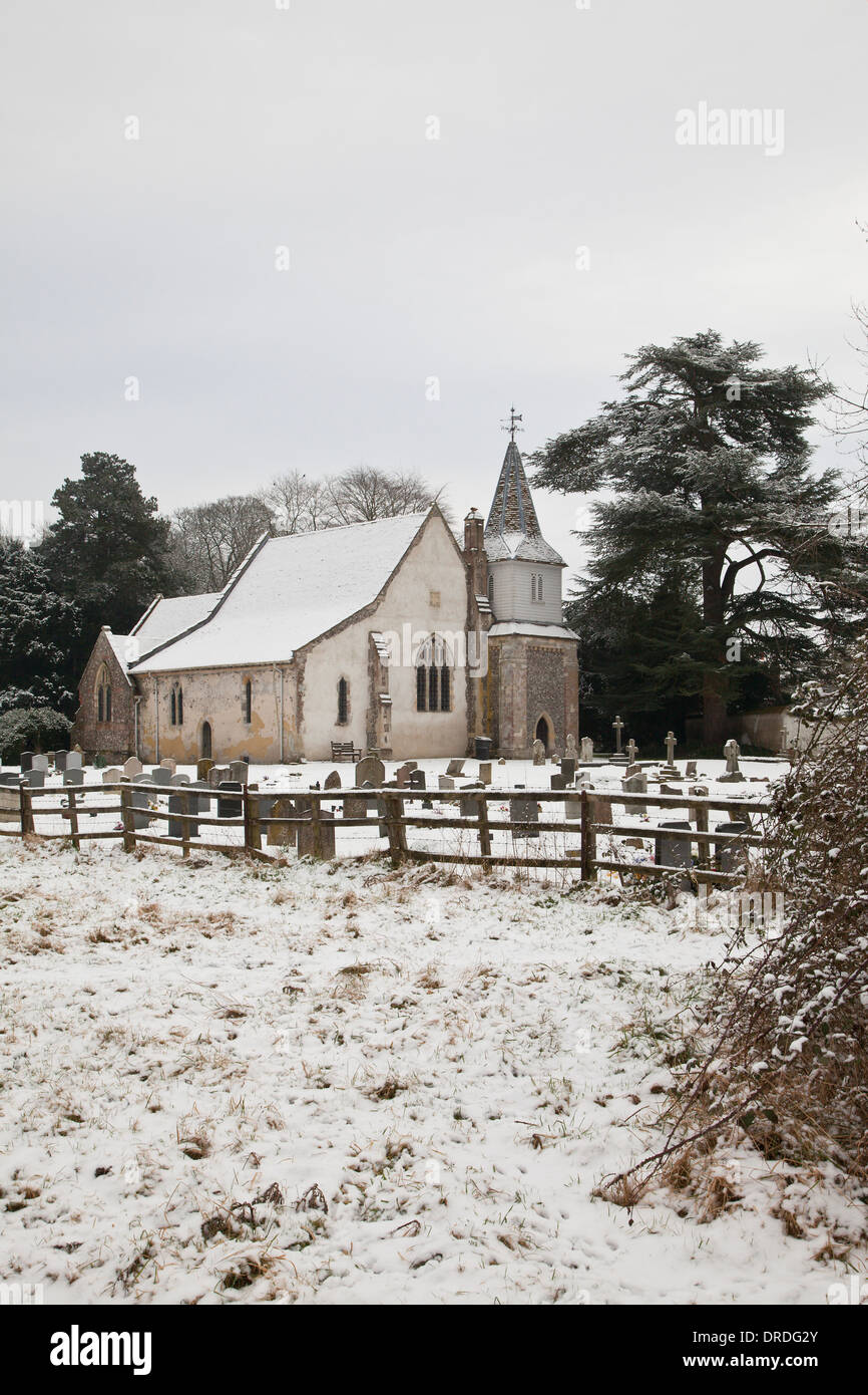 Picturesque winter view of the village Church of St Mary The Less, Chilbolton, Hampshire, in snow Stock Photo