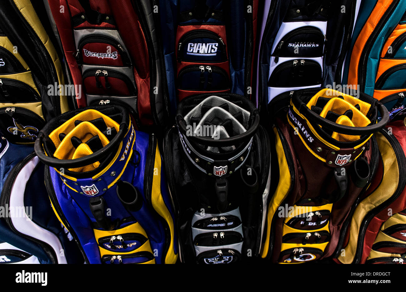 Orlando, Florida, USA. 22nd Jan, 2014. NFL-branded golf bags on display during the PGA Merchandise Show at the Orange County Convention Center. With over one million square feet of exhibit space and 41,000 attendees from all 50 U.S. states and 74 countries, the show serves as a global platform for PGA professionals, industry leaders, manufacturers and golf organizations to grow the business, participation and interest in golf. Credit:  Brian Cahn/ZUMAPRESS.com/Alamy Live News Stock Photo