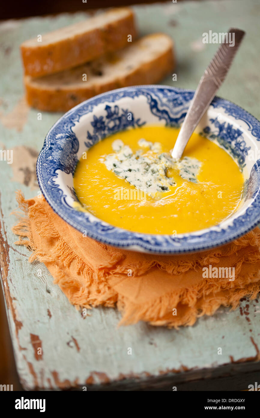 Pumpkin soup in blue bowl Stock Photo