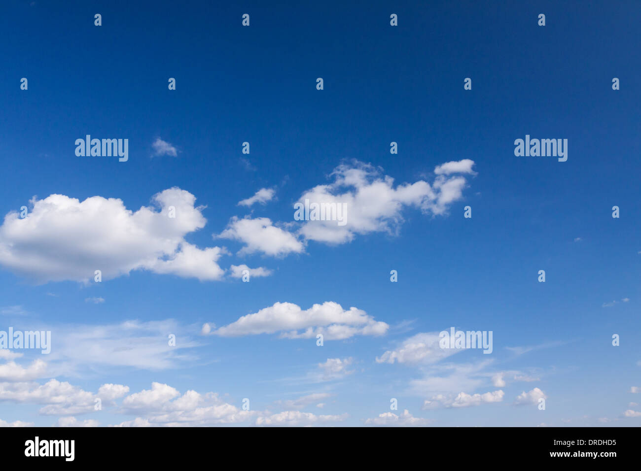 Blue summer sky with white clouds Stock Photo - Alamy