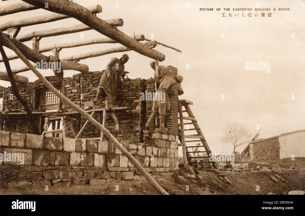 Chinese Carpenter building a house Stock Photo Alamy