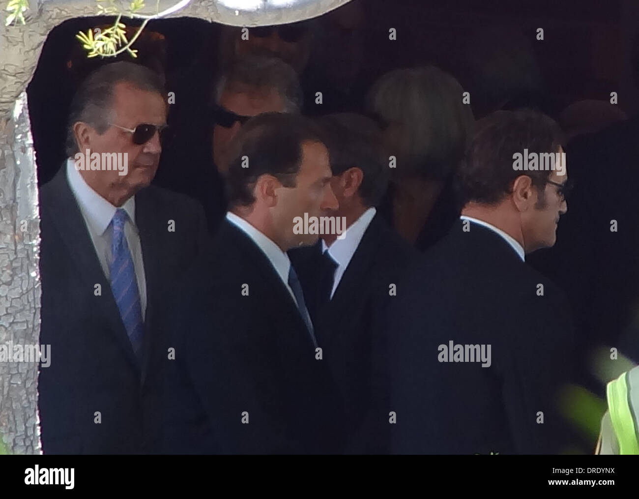 Frank Stallone and mourners leaving the funeral of Sage Stallone at