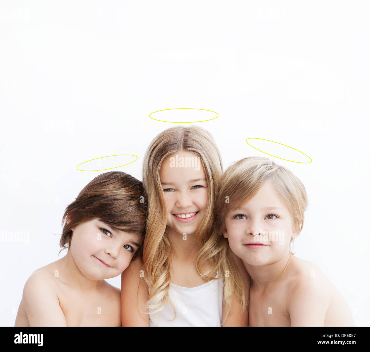 Portrait of siblings with halos Stock Photo