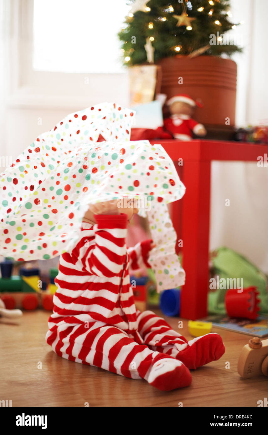 Baby opening christmas presents Stock Photo Alamy