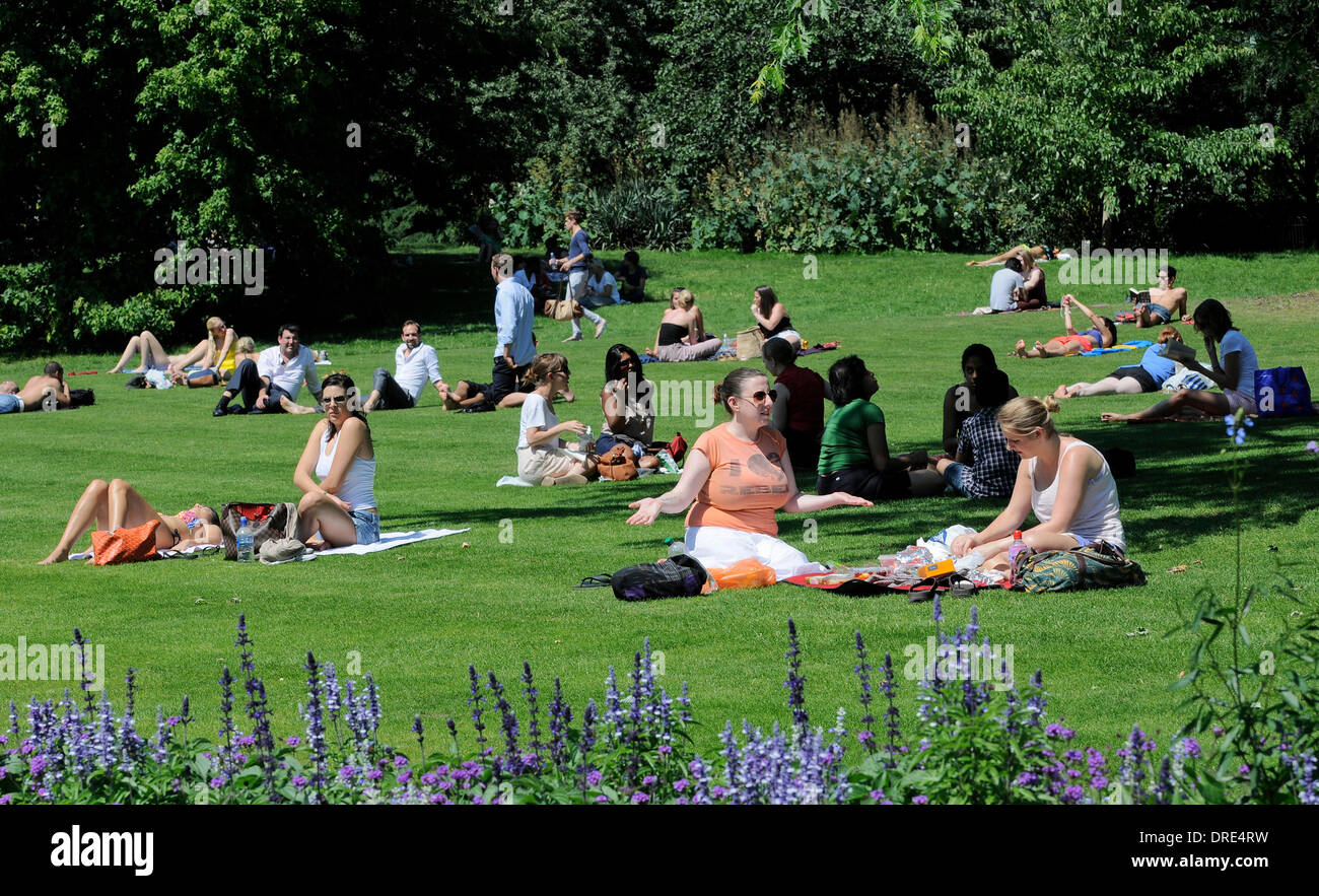 People enjoy the hot weather in Hyde Park London, England 24.07.12