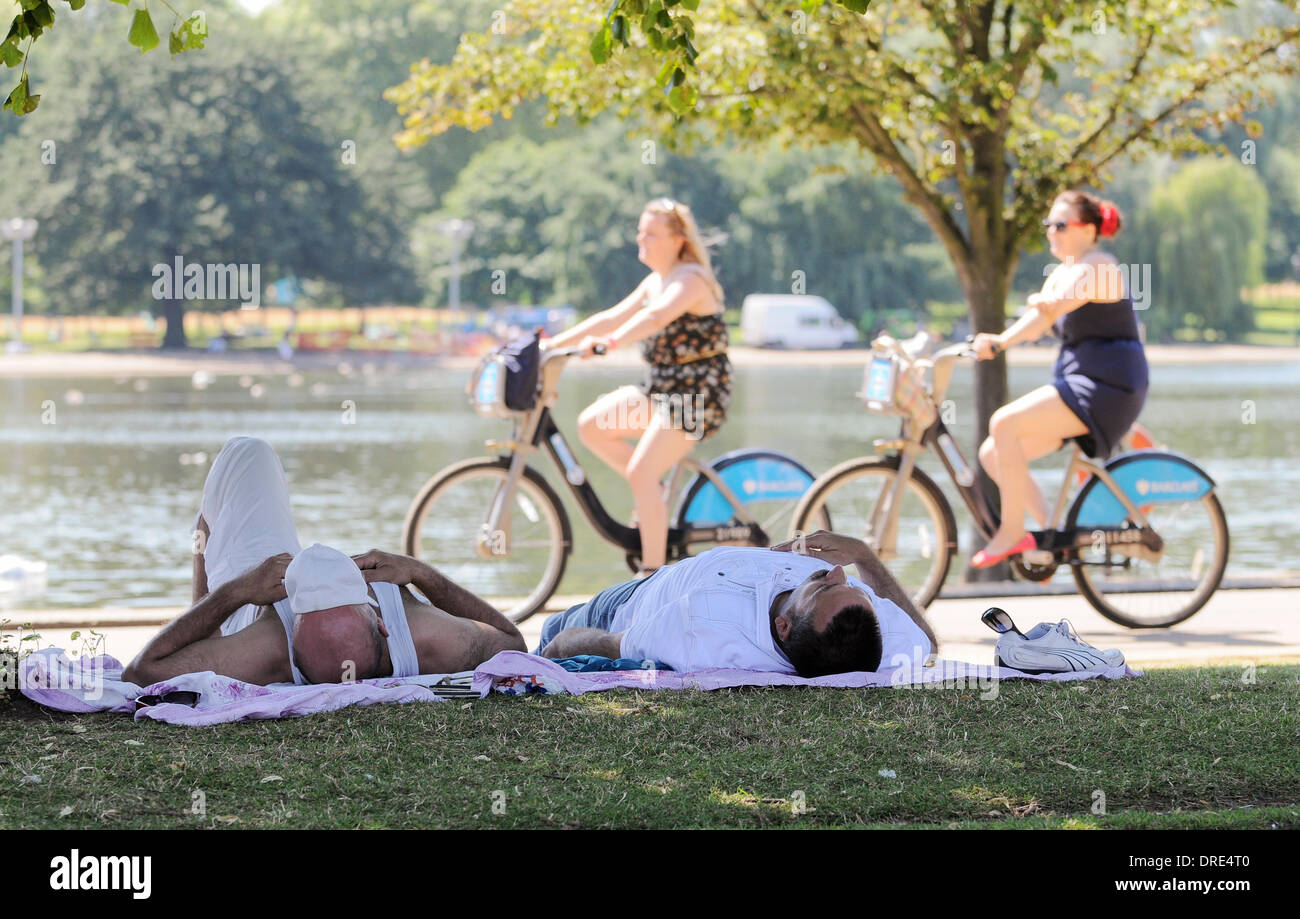 People enjoy the hot weather in Hyde Park London, England 24.07.12