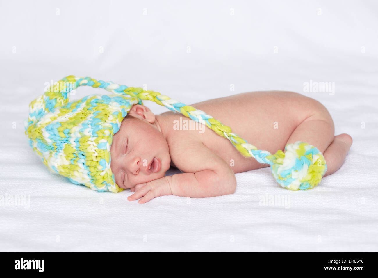 Newborn baby in knitted beanie Stock Photo