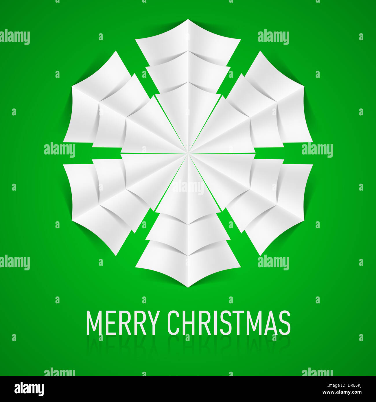 Paper snowflake on green background. Greeting card Stock Photo - Alamy