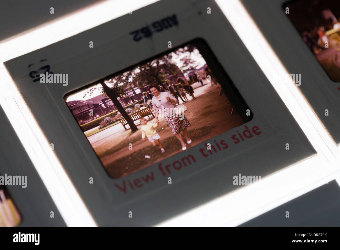 A detail of an old family photo taken on 35mm transparency slide dated from the 1960s. Stock Photo