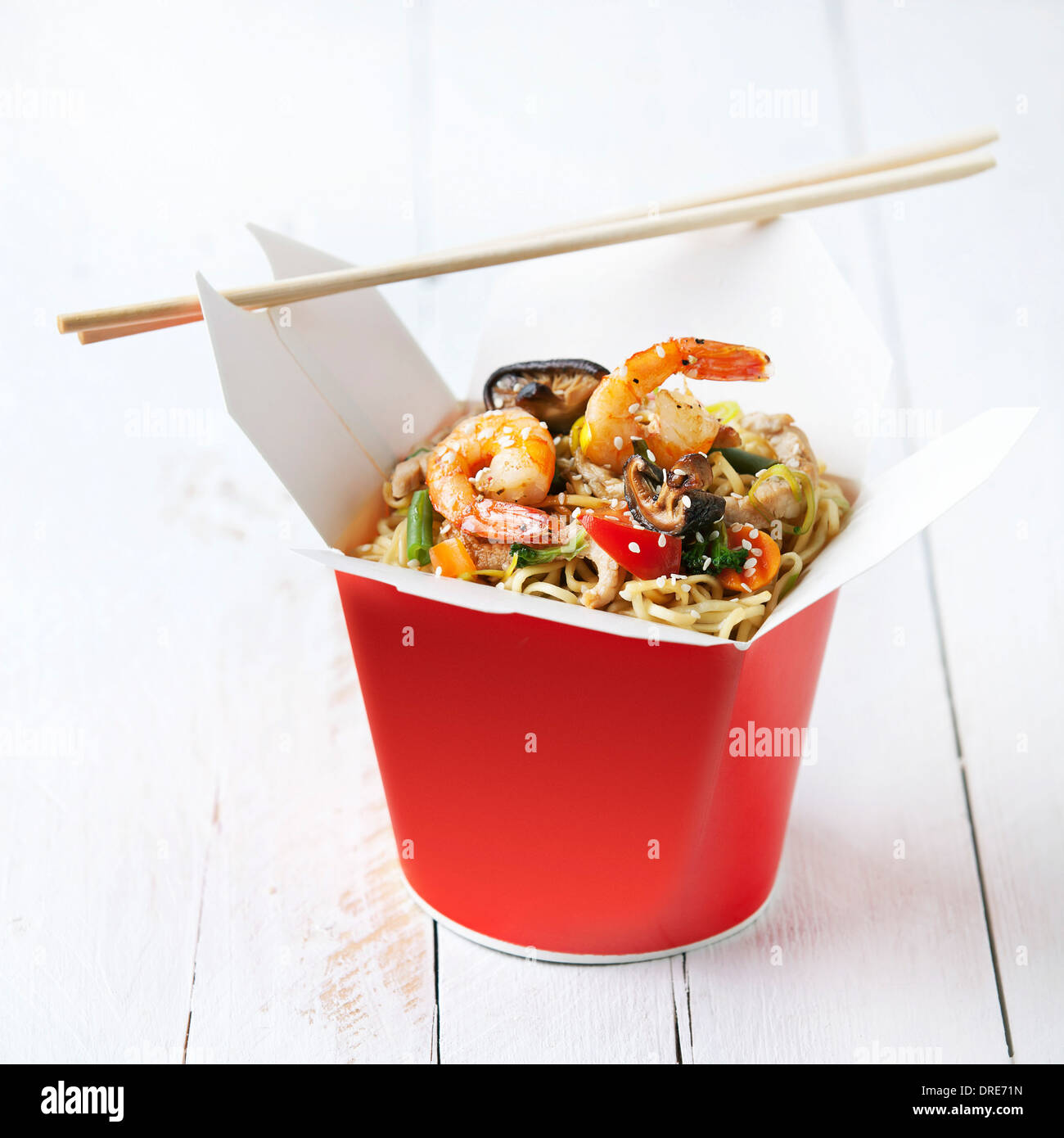 Noodles with shiitake mushrooms, shrimp and pork in sweet and sour sauce Stock Photo