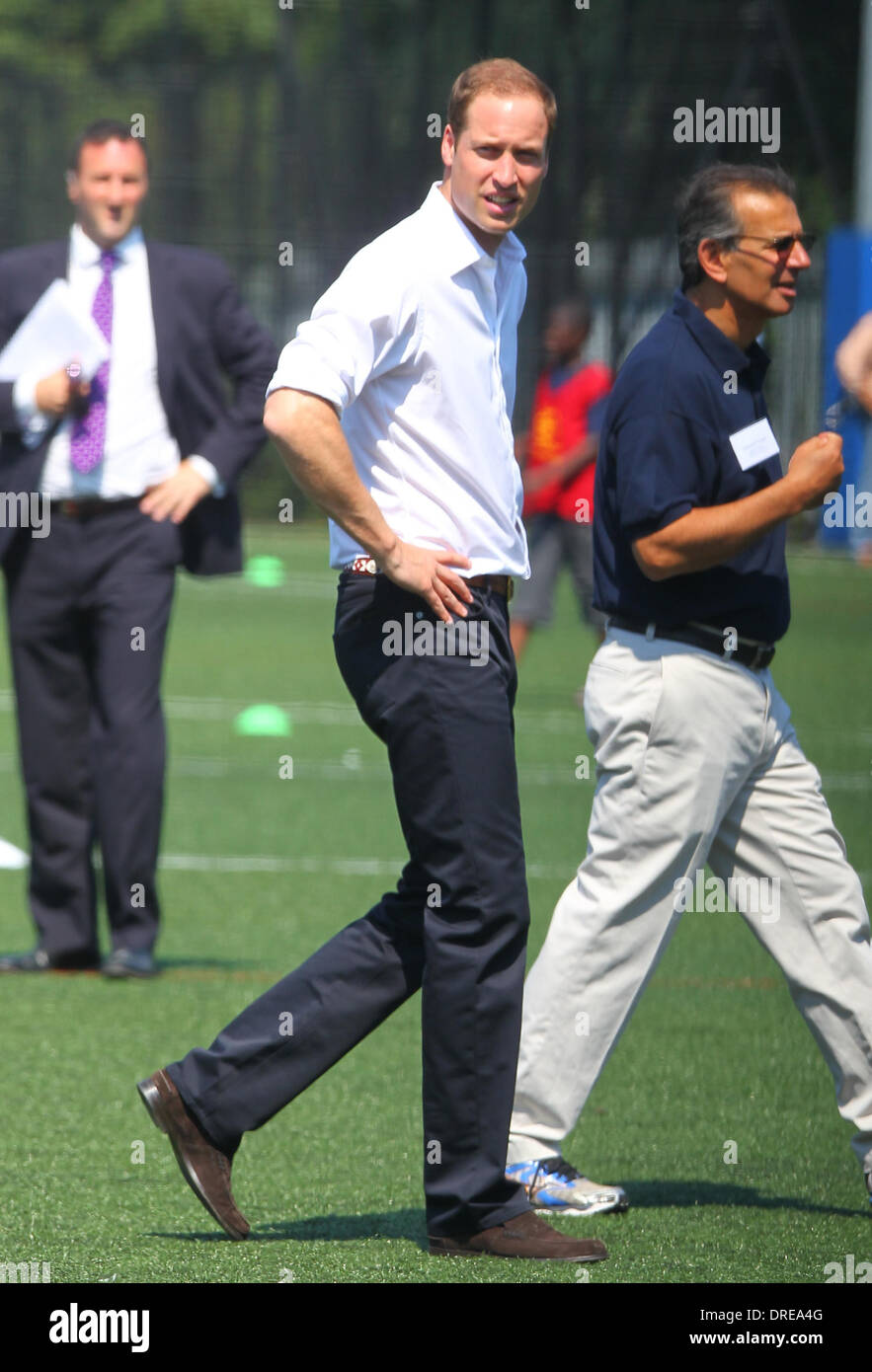 Prince William on the football pitch at Bacon's College London, England 26.07.12 Stock Photo