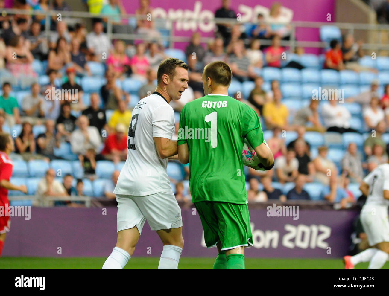 Shane Smeltz and Aleksandr Gutor London 2012 Olympic Games - Men's Football - New Zealand 0 - 1 Belarus at the City of Coventry Stadium Coventry, England - 26.07.12 Stock Photo