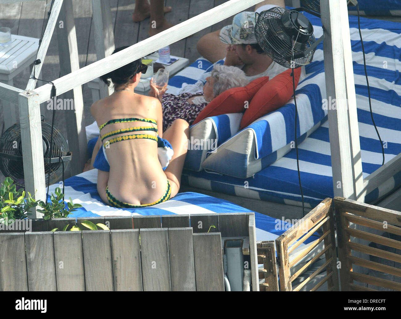 Katy Perry shows off her figure in a green bikini during a break with  friends and family Miami Beach, Florida - 27.07.12 Stock Photo - Alamy