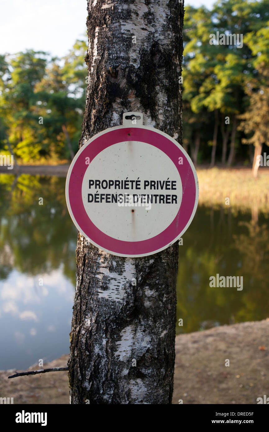 Tree fixed french sign hi-res stock photography and images - Alamy