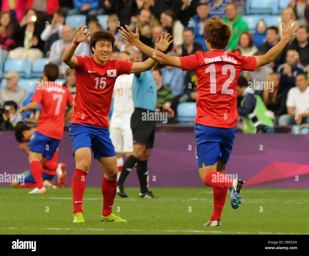 South Korean players celebrate a goal   The Olympic Football Men's Preliminary game between Korea and Switzerland held at the City of Coventry Stadium  Coventry, England - 29.07.12 Stock Photo