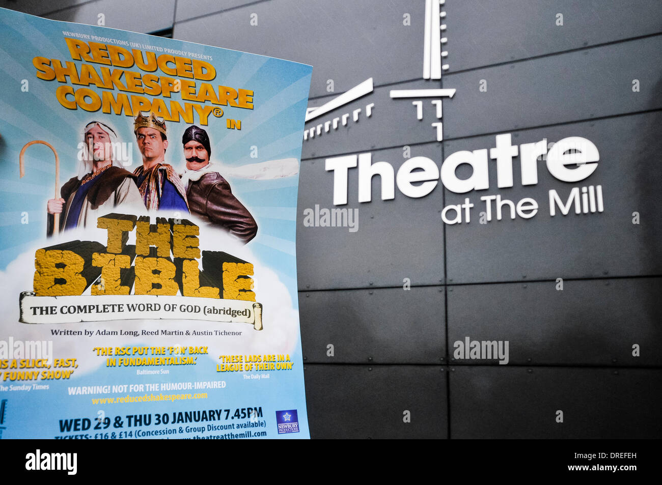 Newtownabbey, Northern Ireland. 24 Jan 2014 - Window poster for the play 'The Bible, the Complete Word of God (abridged)' by the Reduced Shakespeare Company, outside the Theatre at the Mill.  The play had been described as 'blasphemous' by Democratic Unionist Party Member Billy Balls from Newtownabbey Borough Council.  He persuaded the Arts Committee to ban the play from the council-owned theatre.  However, the decision was overturned three days later at a Council Meeting and it subsequently sold out.  The Free Presbyterian Church picketed the performance. Stock Photo