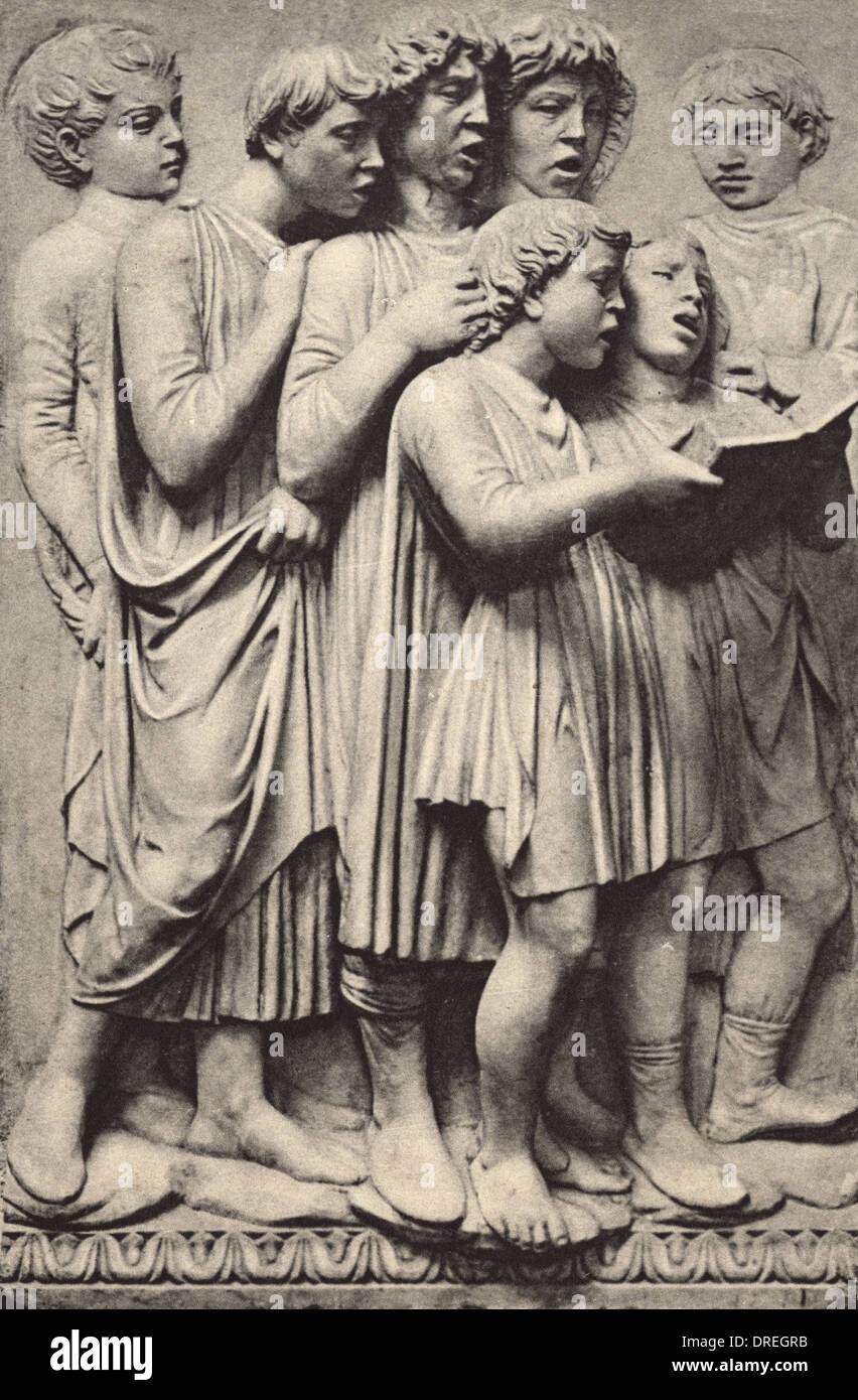 Italian Bas relief of a group of singing Boys Stock Photo