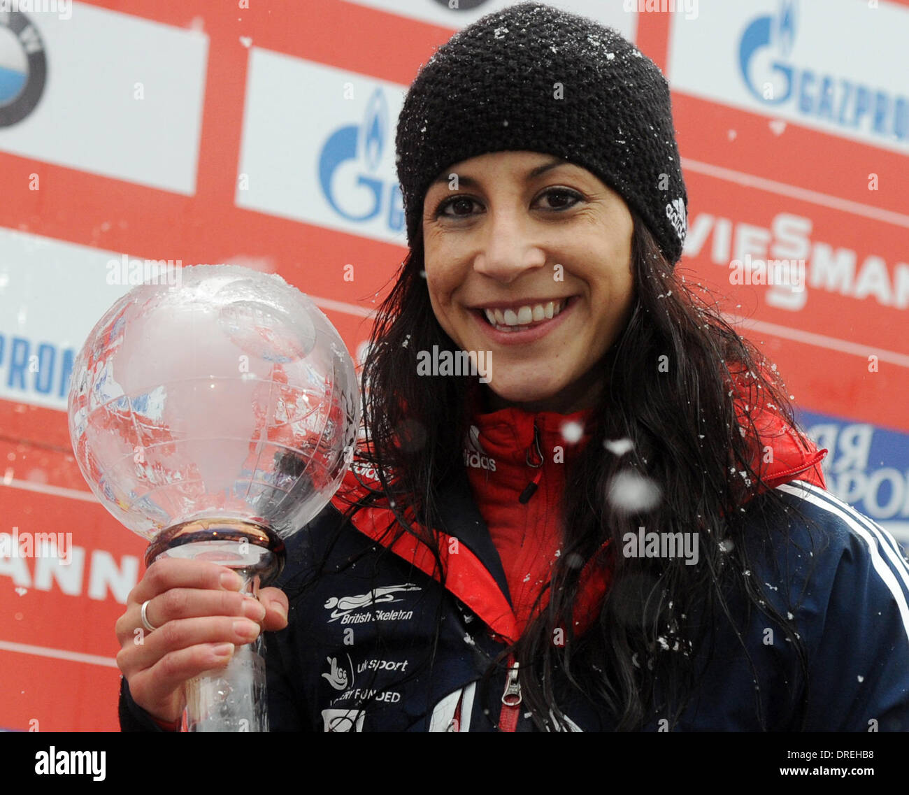 Berchtesgaden, Germany. 24th Jan, 2014. British skeleton driver Shelley Rudman holds her trophy after the skeleton world cup at Koenigssee near Berchtesgaden, Germany, 24 January 2014. Rudman came in third during the race and third for the overall World Cup. Photo: TOBIAS HASE/dpa/Alamy Live News Stock Photo