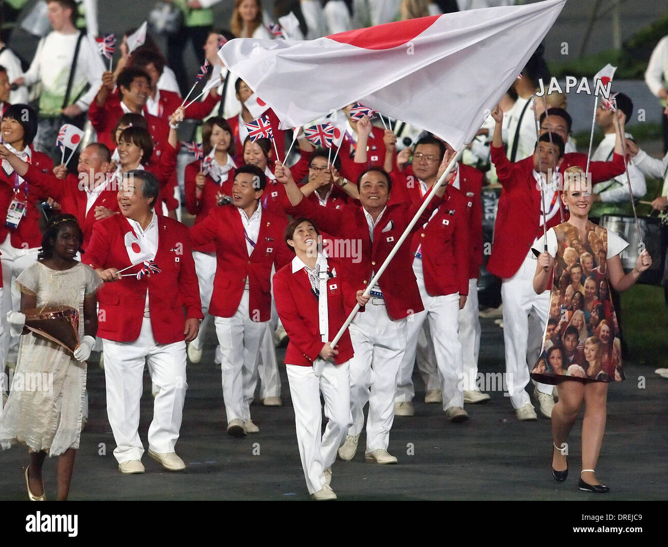 Saori Yoshida of the Japan Olympic wrestling team carries his country's