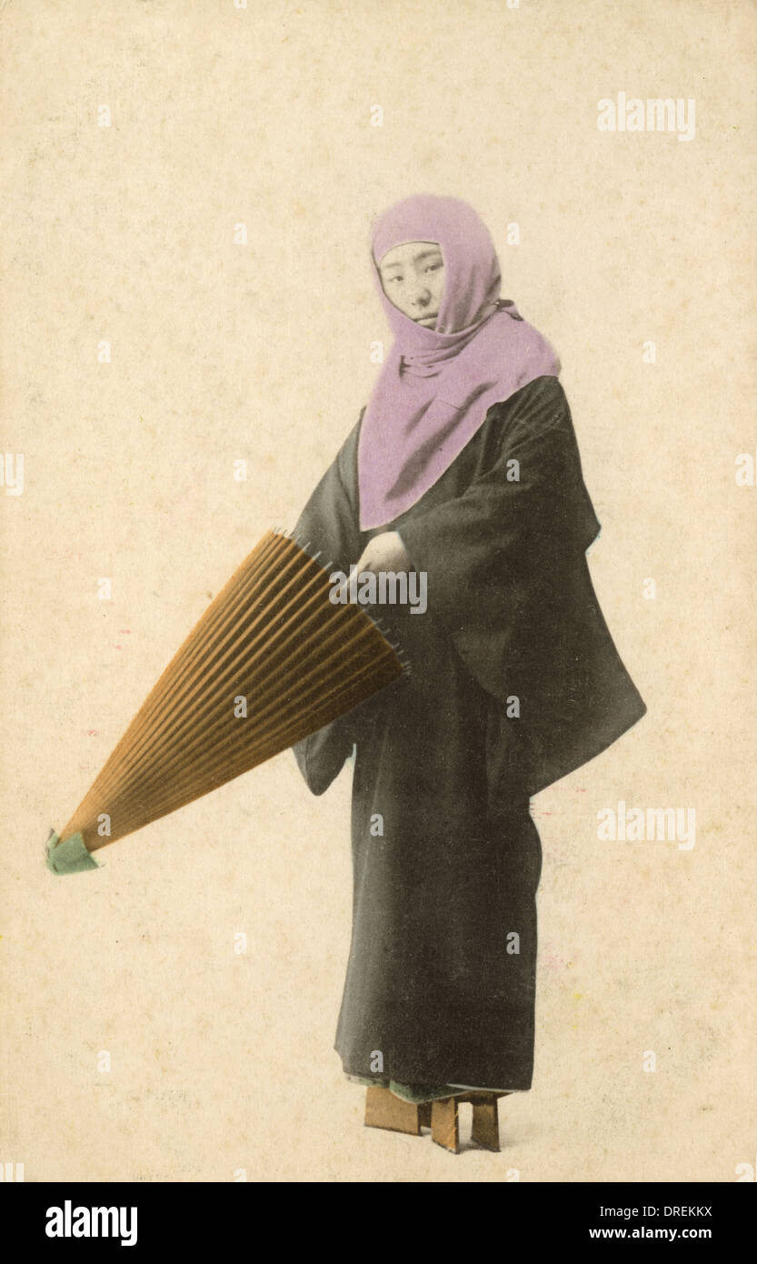 Japanese lady about to unfurl her umbrella Stock Photo Alamy