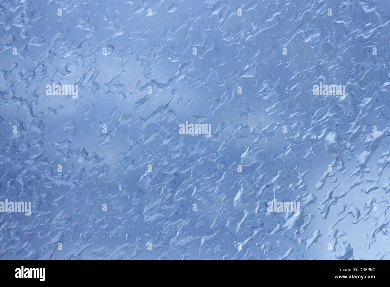 blue abstract frozen water on glass texture Stock Photo