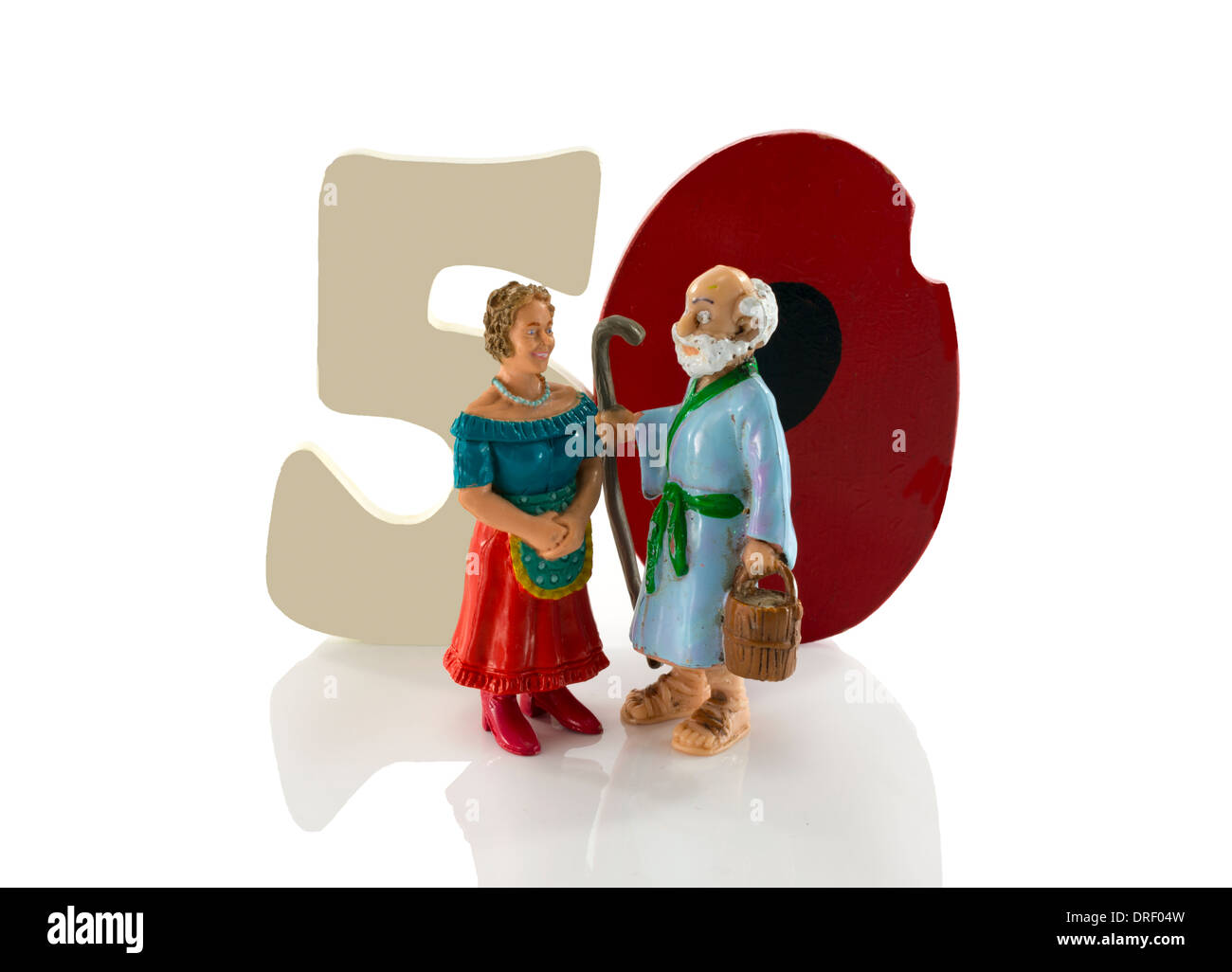 happy older couple with fifty in numbers Stock Photo