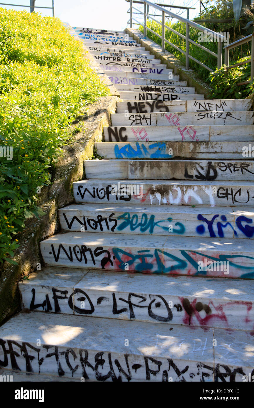 europe greece athens a cement staircase covered with graffiti Stock Photo