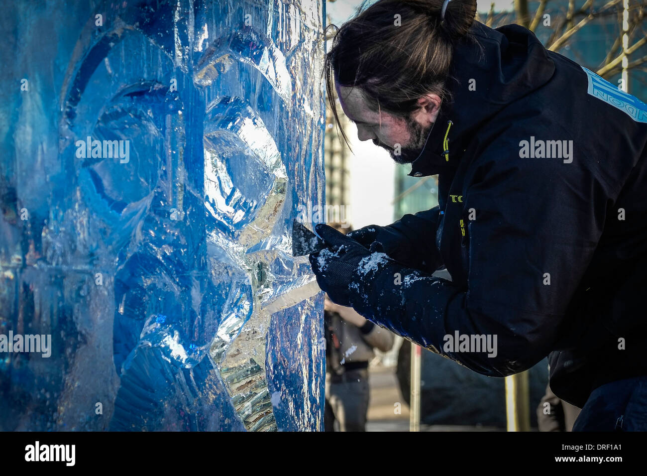 Bruno Fleurit from the f the Spanish team working to create their sculpture as part of the 2014 London Ice Sculpting Festival. Stock Photo