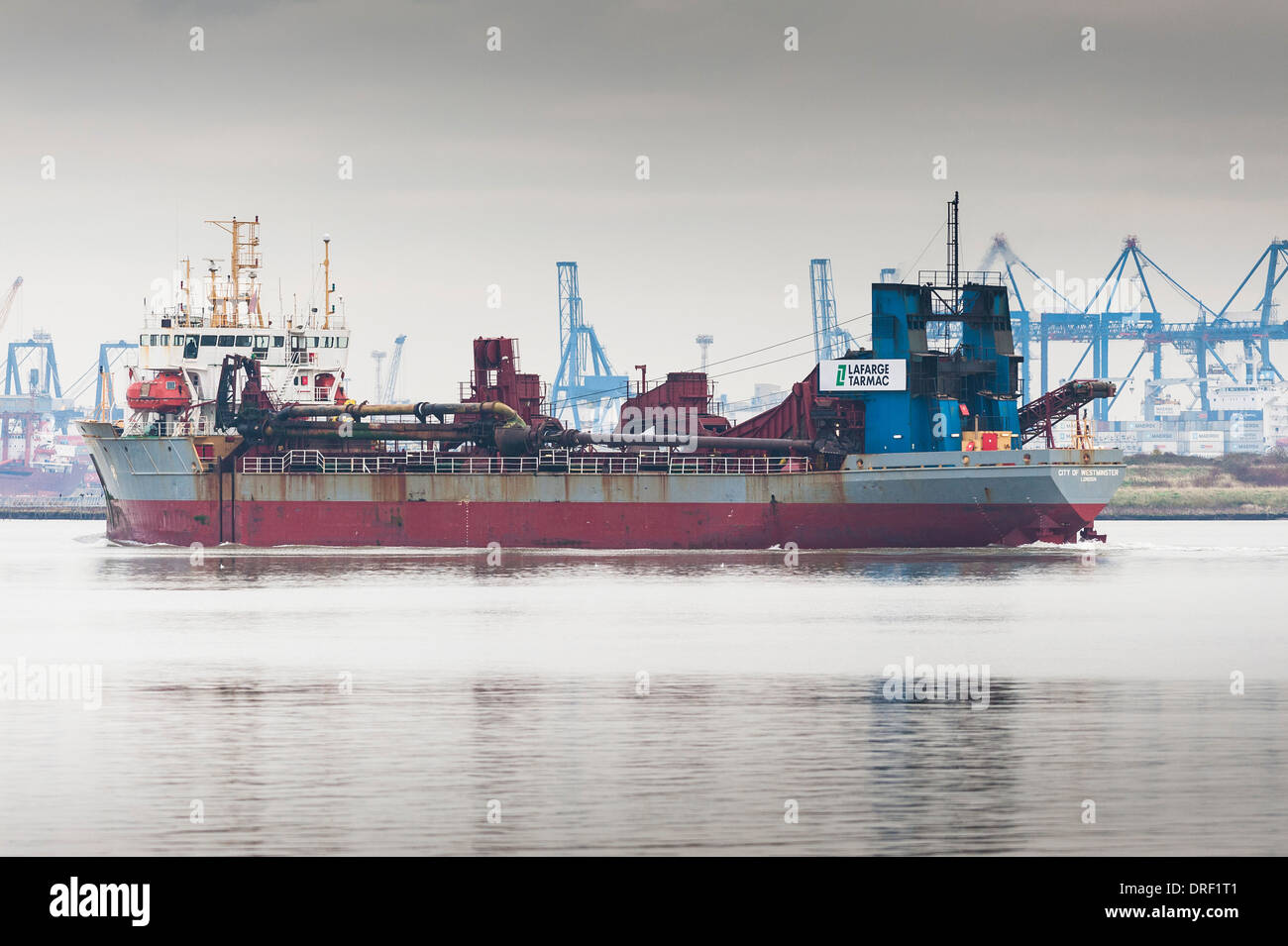 The dredger, City of Westminster, steaming downriver on the Thames. Stock Photo