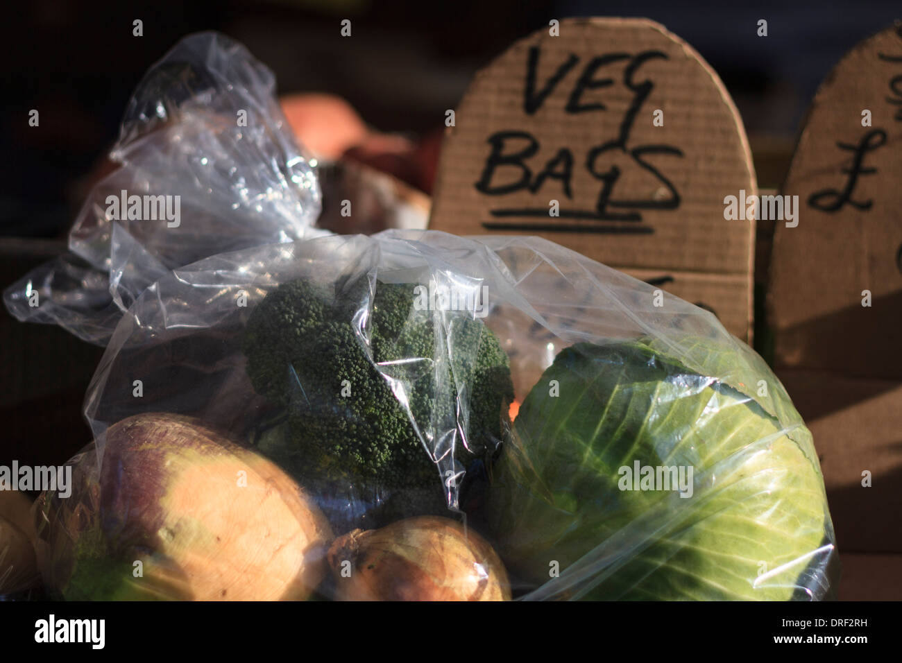 Bagged vegetables for sale at a market stall Stock Photo Alamy