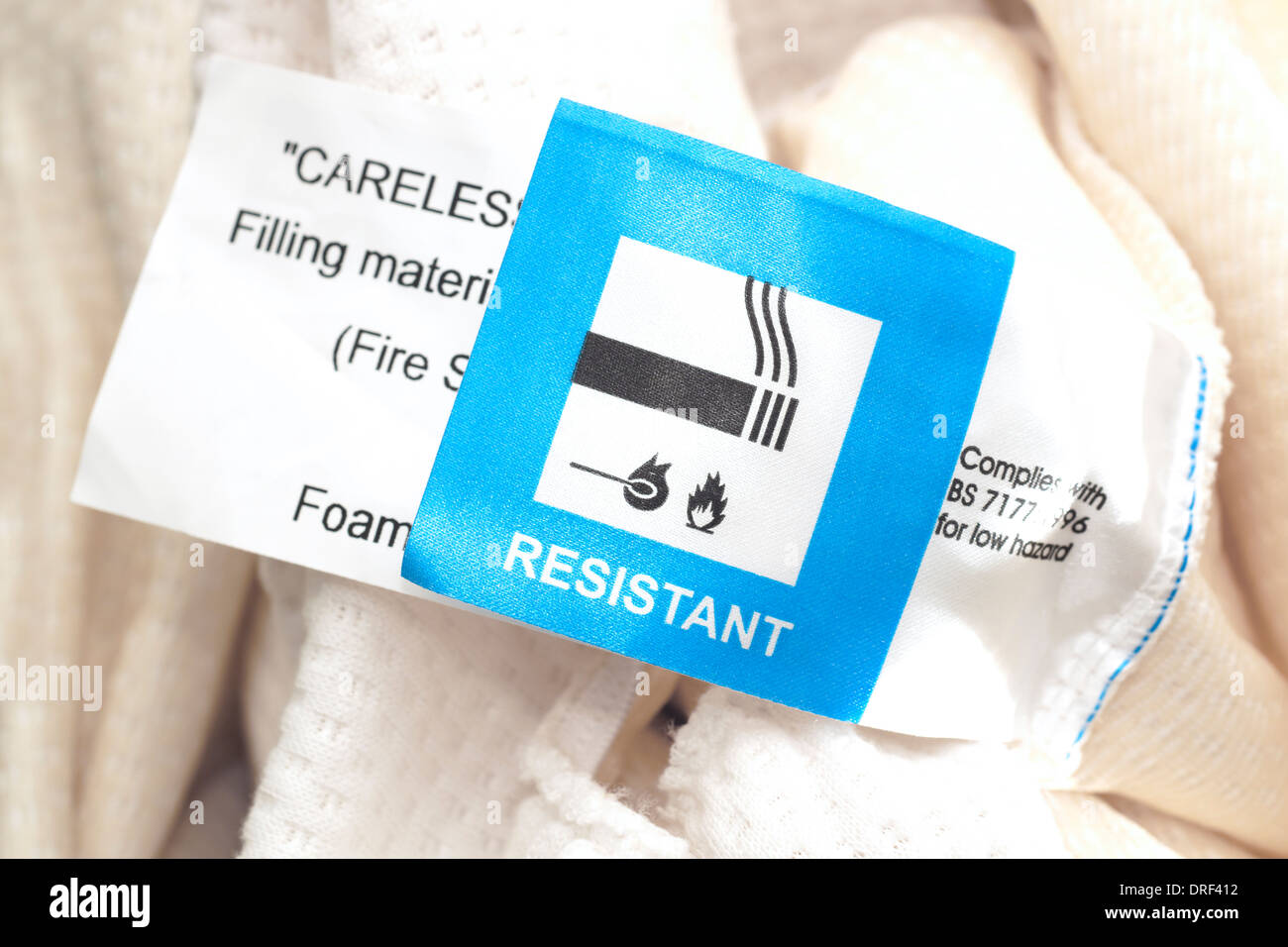 Mattress Topper incorrectly labelled showing the word RESISTANT not in the centre of the label - & could cause a fire hazard Stock Photo