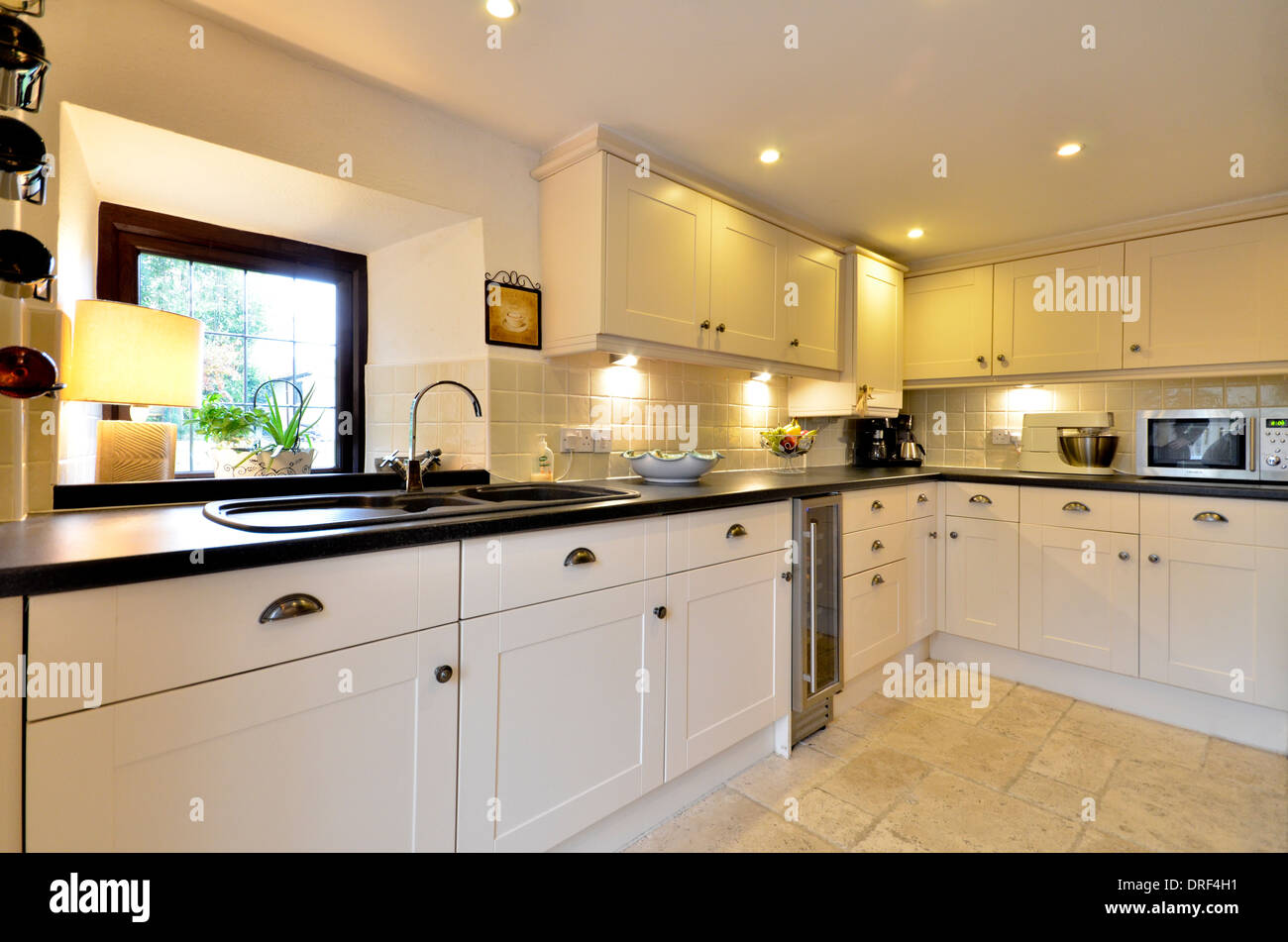 White traditional kitchen units Stock Photo Alamy