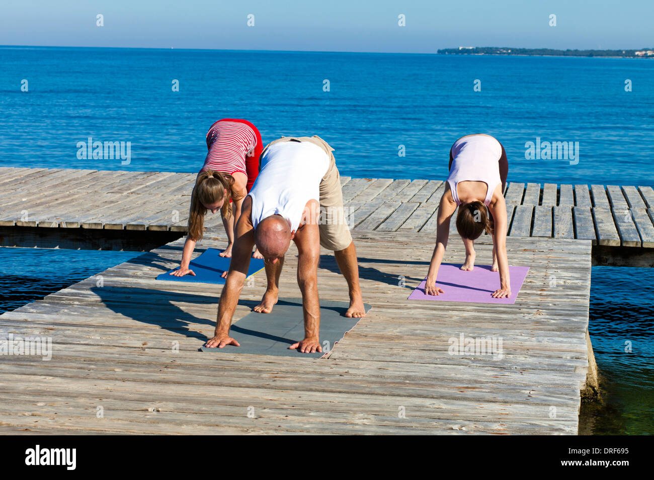 Bending body down over hi-res stock photography and images - Alamy